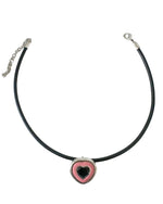 Load image into Gallery viewer, Necklace with a heart-shaped pendant on a light gray background