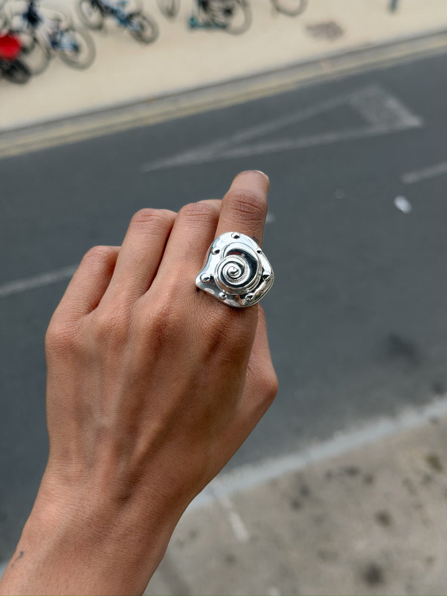 Embossed shell ring