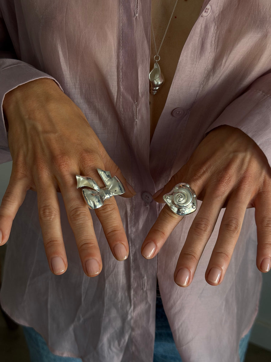 Embossed shell ring