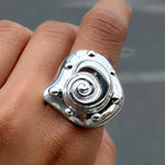 Embossed shell ring