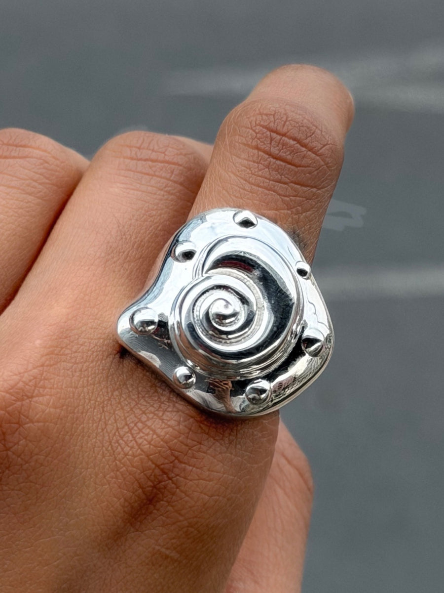 Embossed shell ring