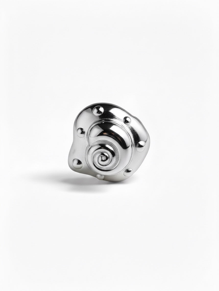 Embossed shell ring