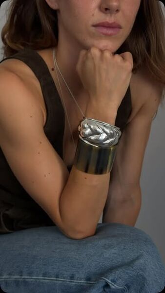 Silver cuffs worn together
